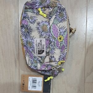 The North Face Cream and Purple Crossbody Bag with Stylish Design